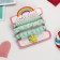 The kit of children's “chosen” 3 objects: elastic band, 2 bracelets, flower, mint color