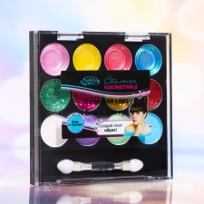 Cosmetics set for girls: shadows, shine, applicator
