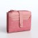Women's wallet on the button, pink color