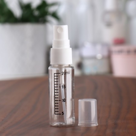 A bottle for storage, with a spray, with a division scale, 20 ml, white/transparent color-2