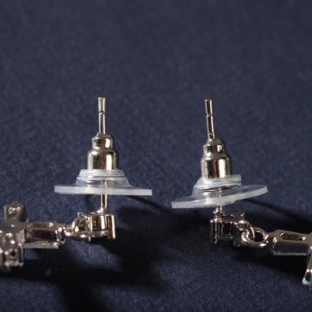 Earrings with rhinestones “Spark crosses” with a putty, white color in silver-2