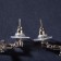Earrings with rhinestones “Spark crosses” with a putty, white color in silver