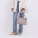 Cross-Bodi Vita with a zipper, beige color