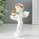 Polystone souvenir "Snowthrough angel with a cake decorated rose" 6x4.5x11 cm