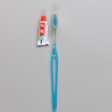 Dental set in a bag: a toothbrush 18 cm + toothpaste 3 g