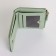 Women's wallet on the button, green color