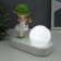 Souvenir Polystone Light "Baby in a green hat, with a gold bubble at the ball" 16.5x8x16 cm
