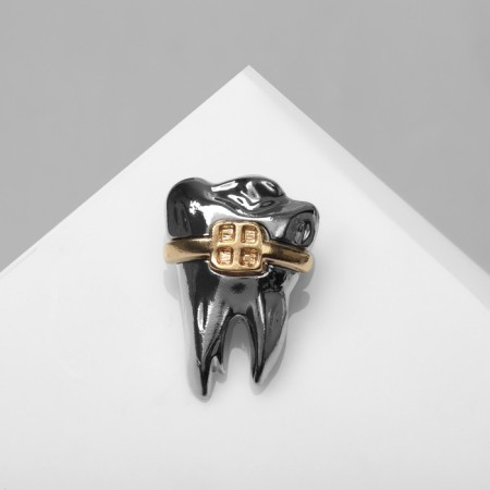 Brooch "Tooth" with braces, the color of silver-gold