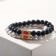 Bracelets "Demetrons" Heart with beads, black and white color, ball No. 8, D = 6.5 cm