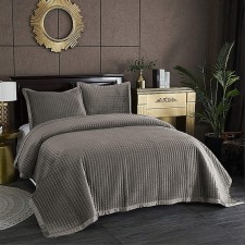 The bedspread and pillowcase 