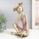 Polystone souvenir "Baby with two tails" gold with pink 21x13.5x26 cm