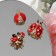 Brooch "God's Layer" form mix, red-black color in gold (indivisible packing 12 pcs., Price per pcs.)