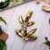 Brooch "Branch Barberis", colored in black gold