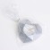 Candle "Heart. Marble" in a candlestick of gypsum with faces, 8x7.5x2.5cm, silver