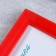 Photo frame plastic L-5 15x21 cm red (plastic screen)