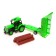 The radio -controlled “farmer” tractor, with a trailer, works on the battery, the color of the green