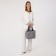 Bag "Golden Rain" with a zipper, 2 outer pockets, a long belt, color gray color