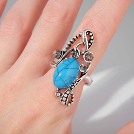 Ring "turquoise world" oval in openwork, a bona-blue-blue-blue in black silver, dimensionless