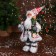 Santa Claus "In a suit with ornaments, skiing and twigs" 31 cm, red-white