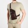 Male sling bag made of artificial leather, brown color