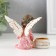 Polystone candlestick for 1 candle "Angel in a dress with a wreath" D-2.2 cm mix 7.2x8.7x5.5 cm