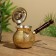 Turk with a lid of 17x23x10 cm, brass