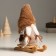 Interior doll "Granny in a fur cap on a sled" 22.5 cm