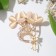 Brooch "Trilisters", white color in gold