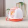Closed toilet with a scoop, 47 x 40 x 39 cm, white-pink