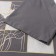 Female T-shirt, dark gray color, one size (42-46)