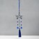 Suspension from the evil eye Metal "Butterfly with bells and brush" 7x30 cm