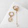 Earrings with the removable element "Transformer" sun, white color in gold