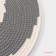 Serving napkin on the table "Hypnosis", d = 38 cm, the color is gray-white