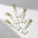Charm "Alpaka", white color in gold