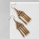 Hanging “vintage” triangle, color black gold, 6 cm
