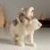 Souvenir Polystone "A child on a white bear" 13.5x6x12.5 cm