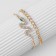 Bracelets set 2 pcs. "Snake" and a chain, white-green color in gold