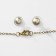 Set 2 objects: earrings, pendant “Wings”, white-raspberry color in black gold, 48 cm