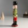 Souvenir Ceramics "A mustachioed Nutcracker in a green-red camisole with a gun" 25x8x6.5 cm