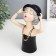 Souvenir Polystone "Girl in a black dress and hat, with beads" 23x9.5x18.5 cm