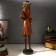 Souvenir Polystone "Leo in brown-green camisole in a hat with a pen" 52.5x11.5x13 cm