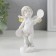 Polystone souvenir "Snowthrough angel with music plates" 10.2x7x5 cm
