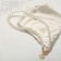 The necklace "Pearls" circle, ball No. 10, white color in gold, l = 45 cm
