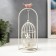Summary Metal for 1 candle "A cage with flowers with pink bird" White 28.5x12x12 cm