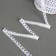 Belaya guipure braid with sequins 1.5 cm, in a roll 548 m