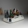 Souvenir plastic light "Santa Claus decorates the Christmas tree" is spinning 26.5x16x17.5 cm