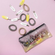 A set of rubber bands and hair hair clips 