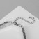 Bracelet Metal "relief" narrow, 26 cm, silver color