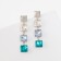 Earrings with “Bloom” rhinestones, light squares, colored in silver