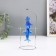 Dolphins pendulum opposite each other with a ball of 9 x 15 x 19.5 cm